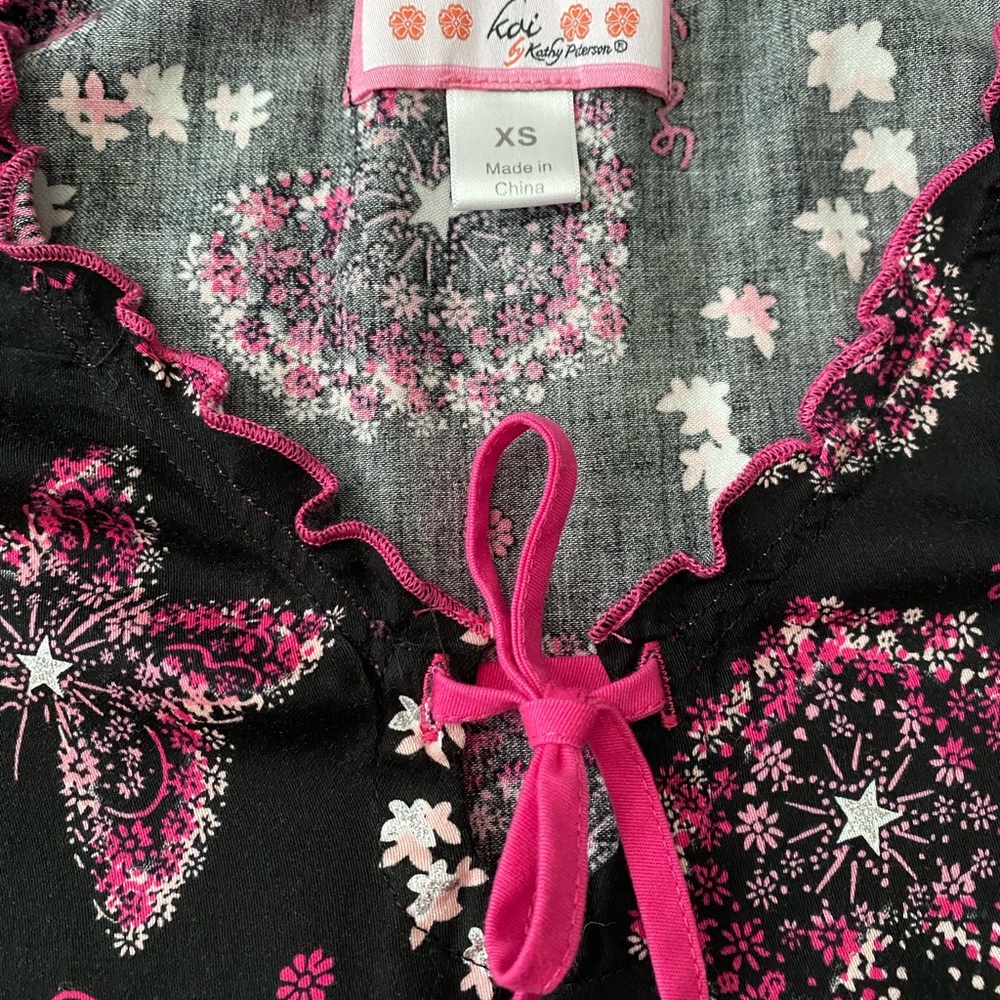 Koi Scrub top, size XS, used once but in new condition, pink butterflies/hearts.